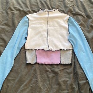 Cropped lettuce hem shirt